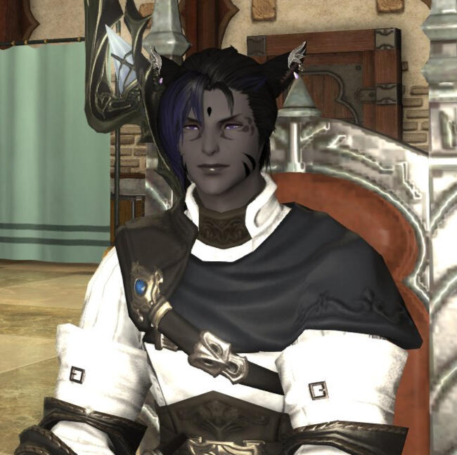 A dark-skinned Keeper of the Moon with purple eyes, clad in healers' robes.